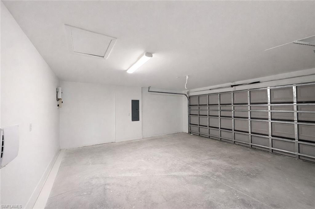 2709 22nd Street Southwest Lehigh Acres, FL 33976 - Photo 15 of 18 a view of a garage