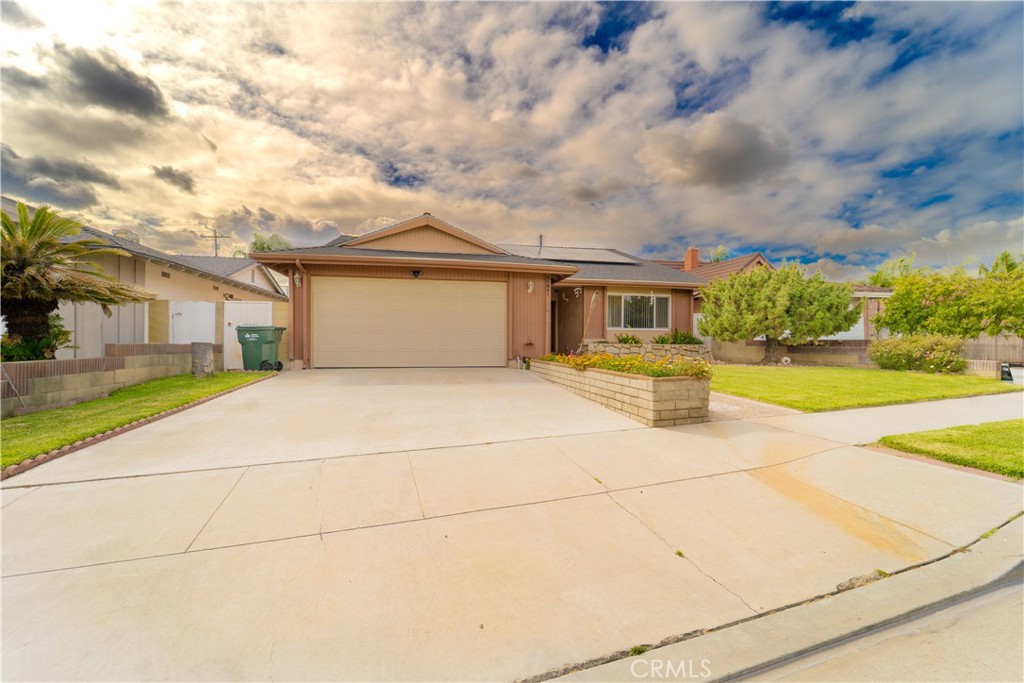 9221 Pico Vista Road Downey, CA 90240 - Photo 1 of 38 a view of garage yard and glass door