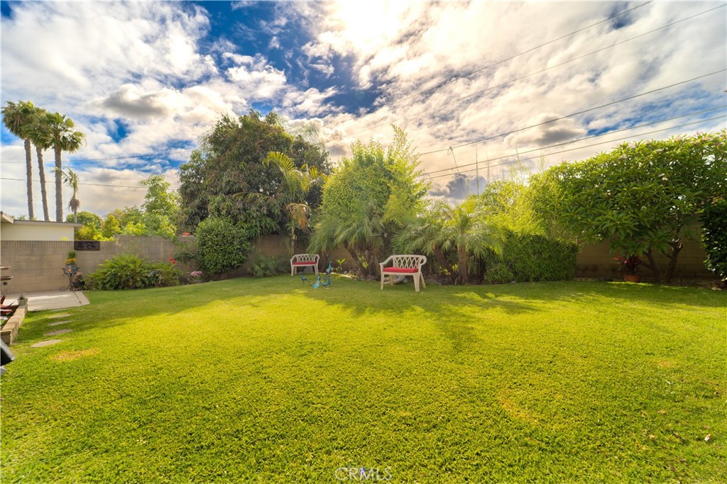 9221 Pico Vista Road Downey, CA 90240 - Photo 21 of 38 a view of a swimming pool and an outdoor space