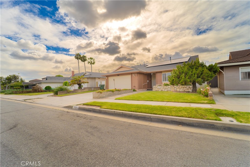 9221 Pico Vista Road Downey, CA 90240 - Photo 26 of 38 a view of swimming pool with outdoor seating and yard in back