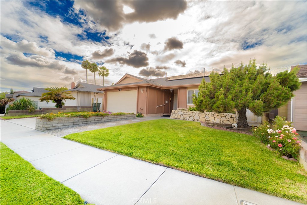 9221 Pico Vista Road Downey, CA 90240 - Photo 27 of 38 a view of a house with a swimming pool