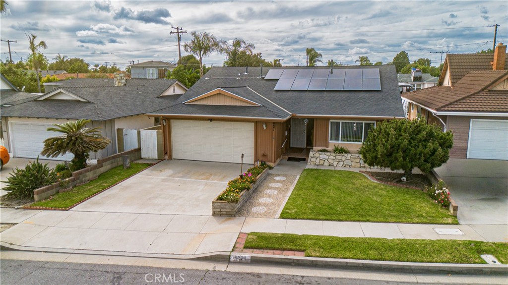 9221 Pico Vista Road Downey, CA 90240 - Photo 29 of 38 front view of house with a yard