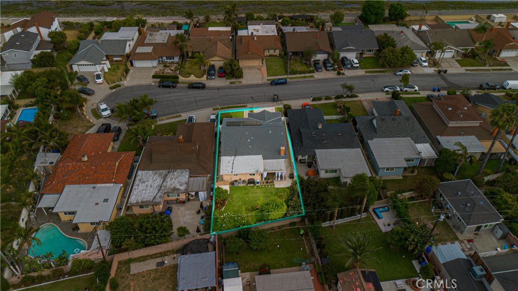 9221 Pico Vista Road Downey, CA 90240 - Photo 33 of 38 an aerial view of multiple houses with yard