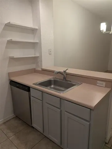 a utility room with sink
