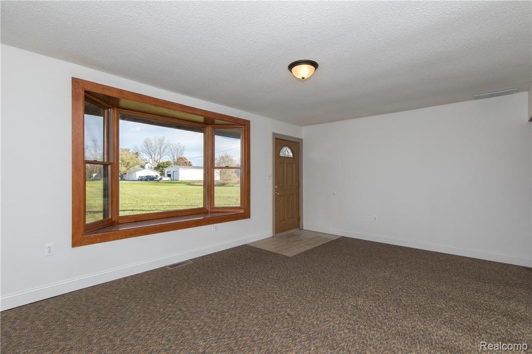 7334 East Potter Road Davison, MI 48423 - Photo 36 of 57 LivingRoom2.jpg