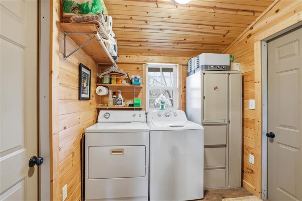 1401 Adair Mill Road Cleveland, GA 30528 - Photo 19 of 62 a utility room with dryer and washer