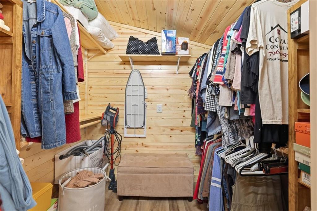 1401 Adair Mill Road Cleveland, GA 30528 - Photo 28 of 62 a view of walk in closet with clothes