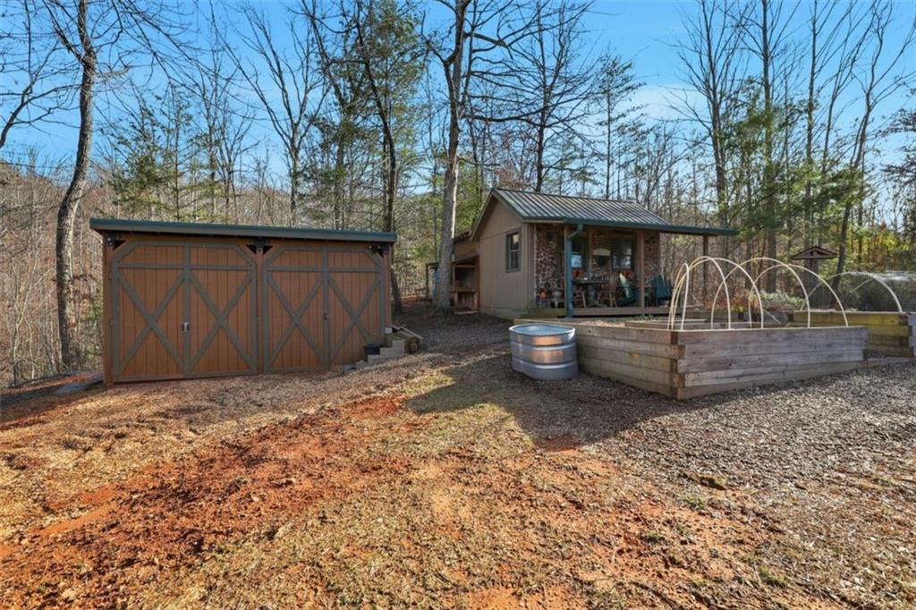 1401 Adair Mill Road Cleveland, GA 30528 - Photo 47 of 62 a view of a house with a outdoor space