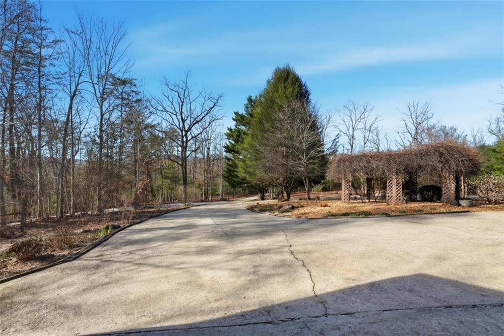 1401 Adair Mill Road Cleveland, GA 30528 - Photo 50 of 62 a view of a playground with basketball court
