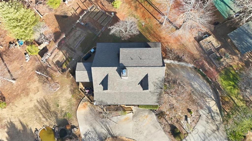 1401 Adair Mill Road Cleveland, GA 30528 - Photo 56 of 62 a white house with a tree in the background