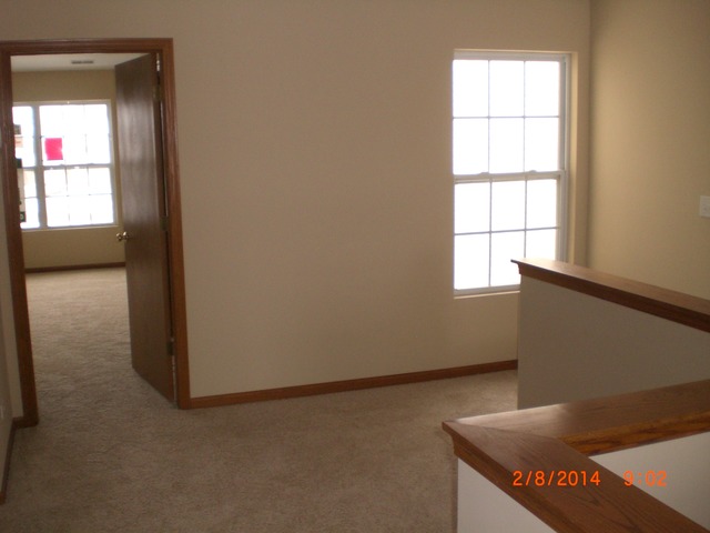 1974 West Cobblestone Road, Unit 3532303 Romeoville, IL 60446 - Photo 15 of 23 an entryway with a window
