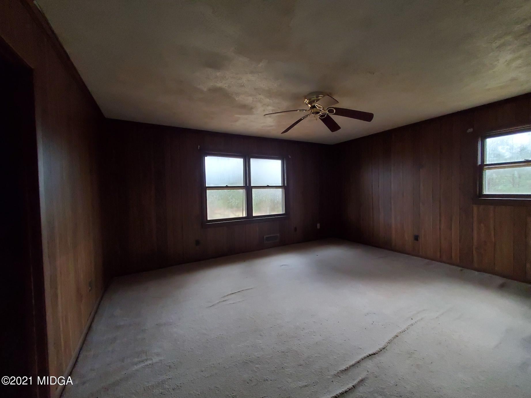 462 Thomas Ferry Road Jackson, GA 30233 - Photo 14 of 27 a view of an empty room with a window