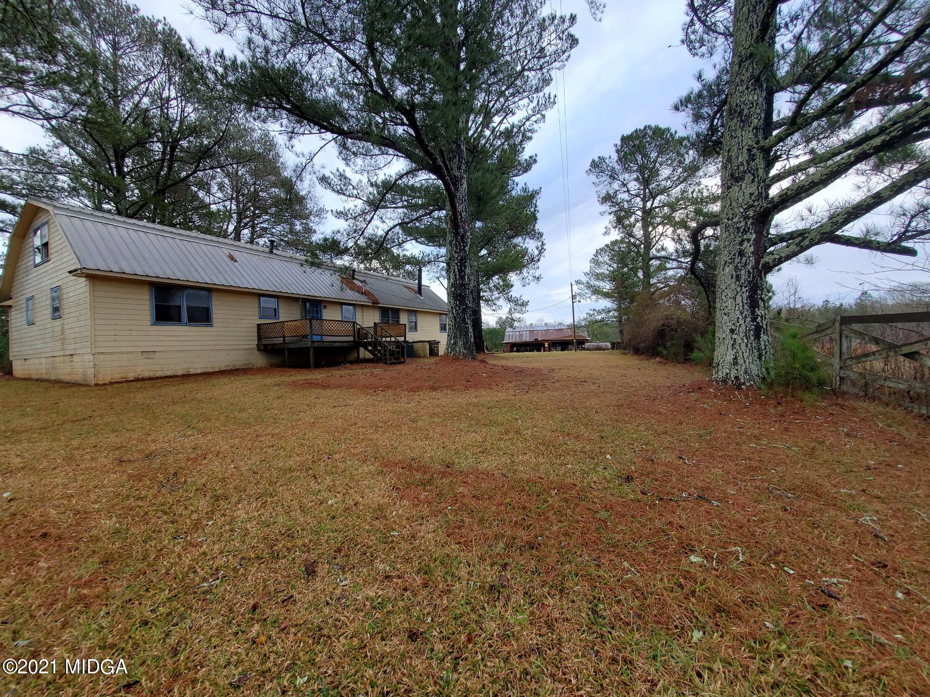 462 Thomas Ferry Road Jackson, GA 30233 - Photo 25 of 27 a view of a house with a yard