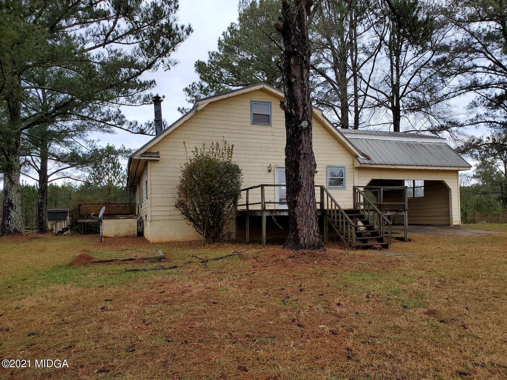 462 Thomas Ferry Road Jackson, GA 30233 - Photo 26 of 27 a view of a house with a patio