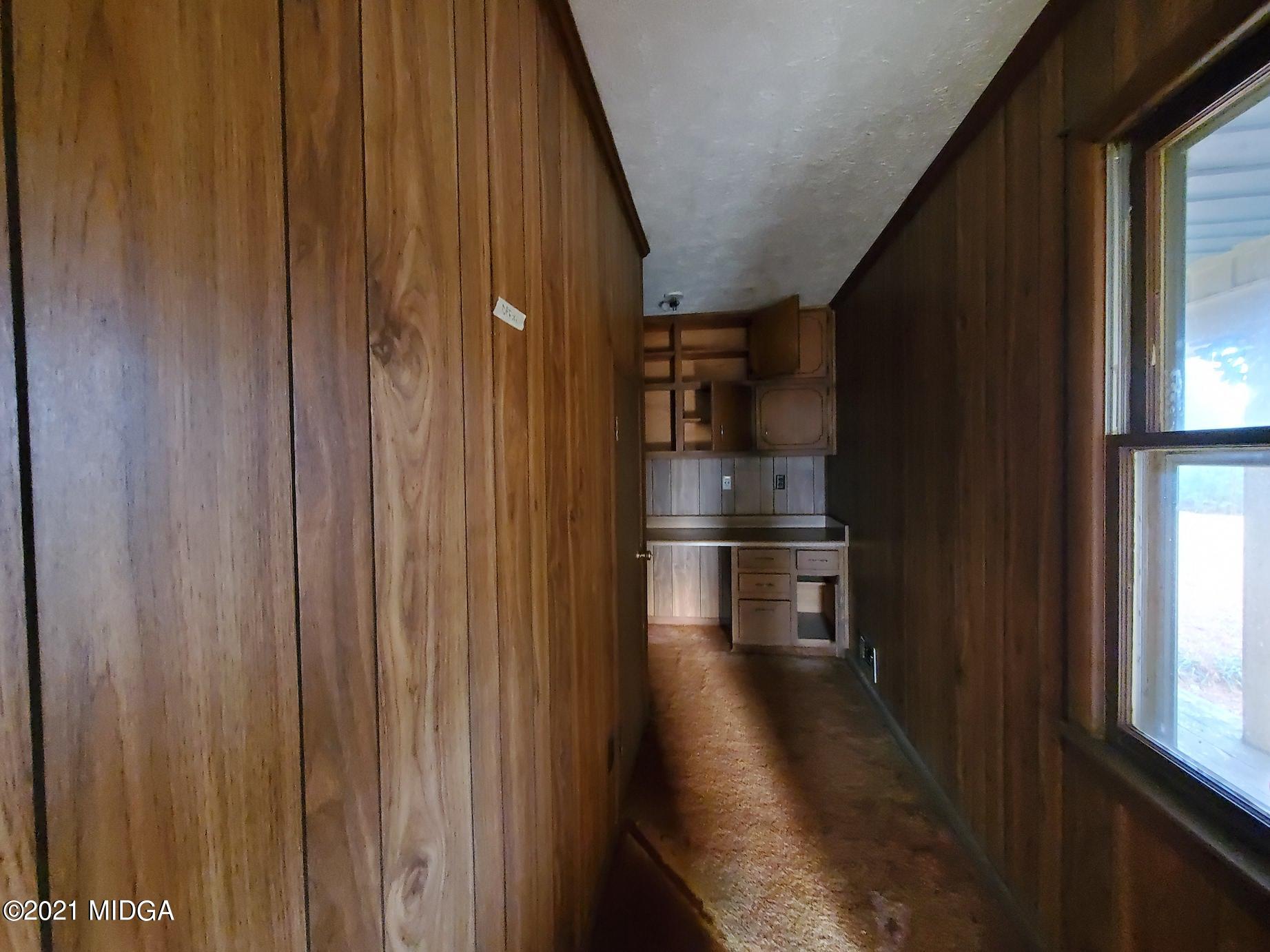 462 Thomas Ferry Road Jackson, GA 30233 - Photo 4 of 27 a view of a kitchen from the hallway