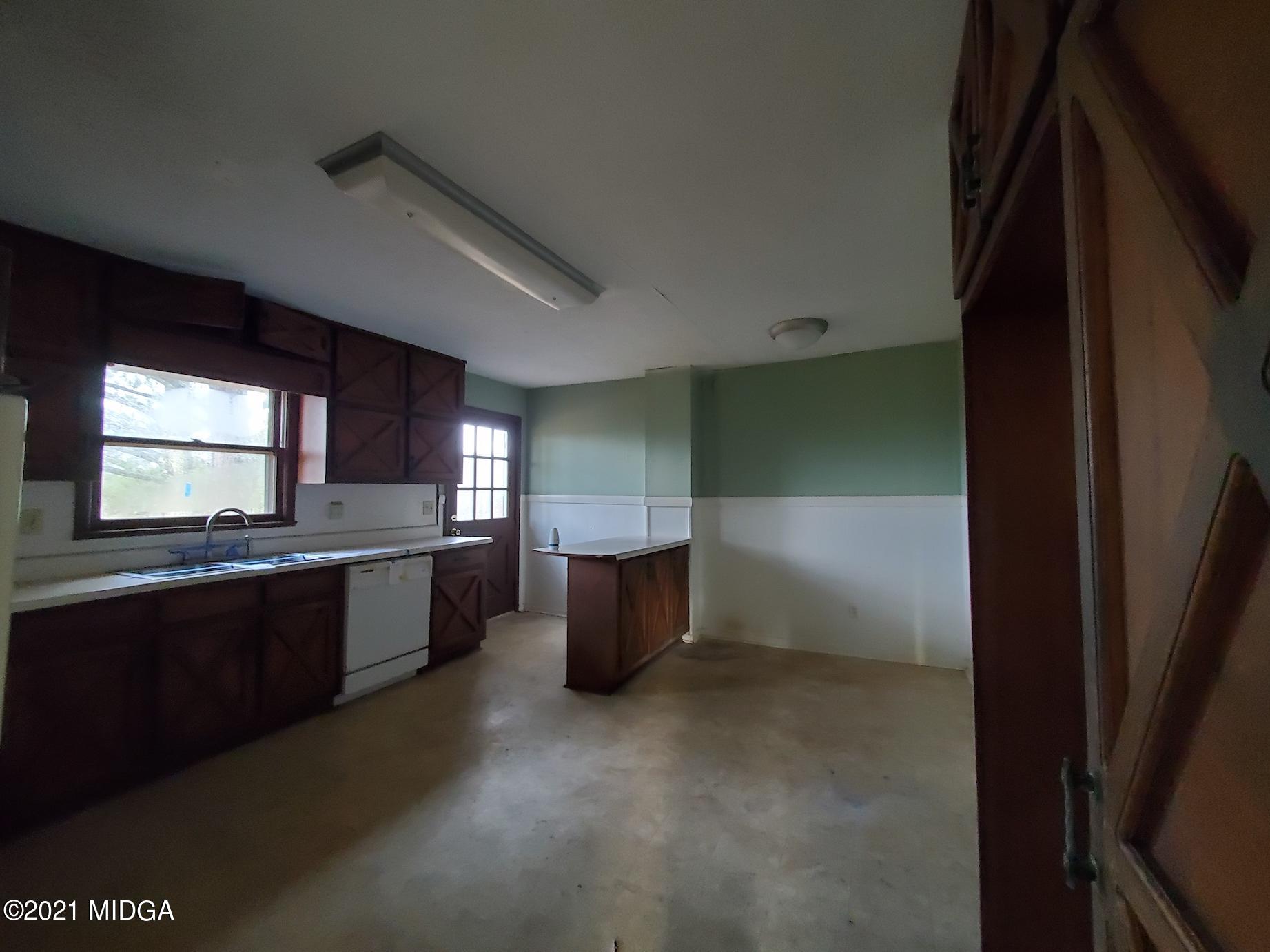 462 Thomas Ferry Road Jackson, GA 30233 - Photo 7 of 27 a large kitchen with a stove
