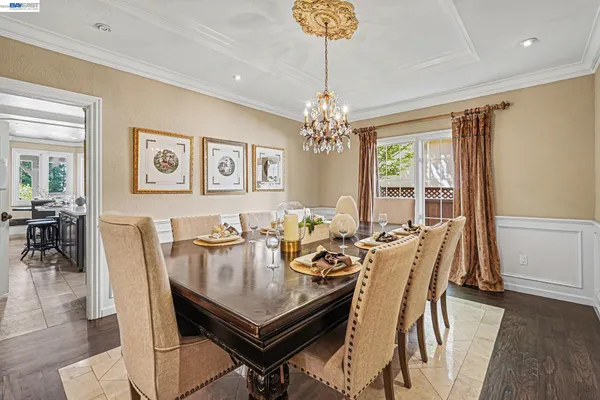 a kitchen with stainless steel appliances granite countertop a stove and a refrigerator