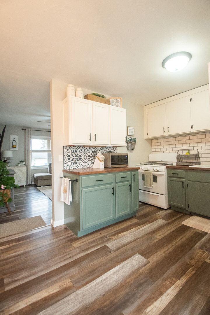 617 Orchard Street Dixon, IL 61021 - Photo 15 of 32 a kitchen with a sink and cabinets