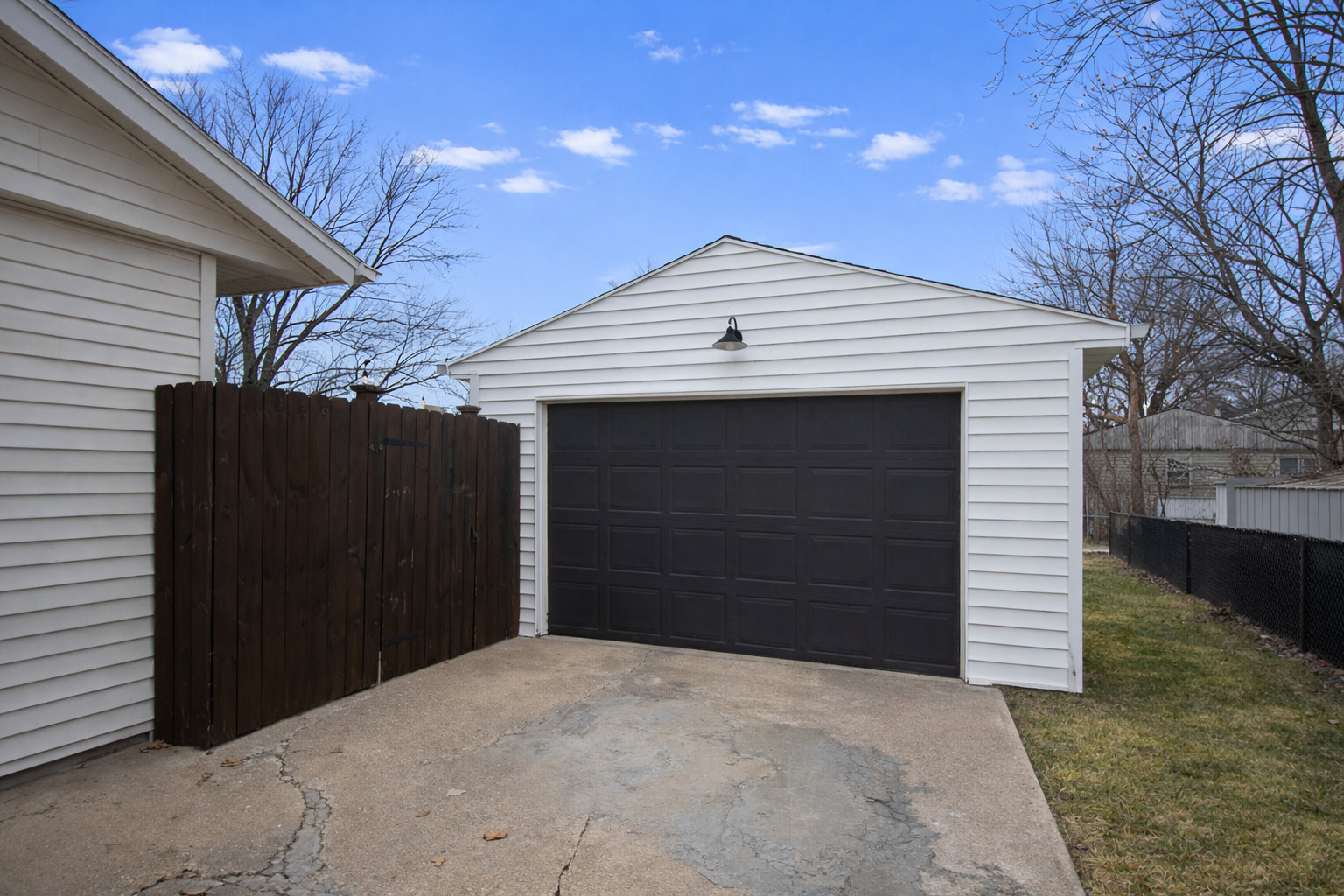 617 Orchard Street Dixon, IL 61021 - Photo 3 of 32 a front view of a house with a yard and garage