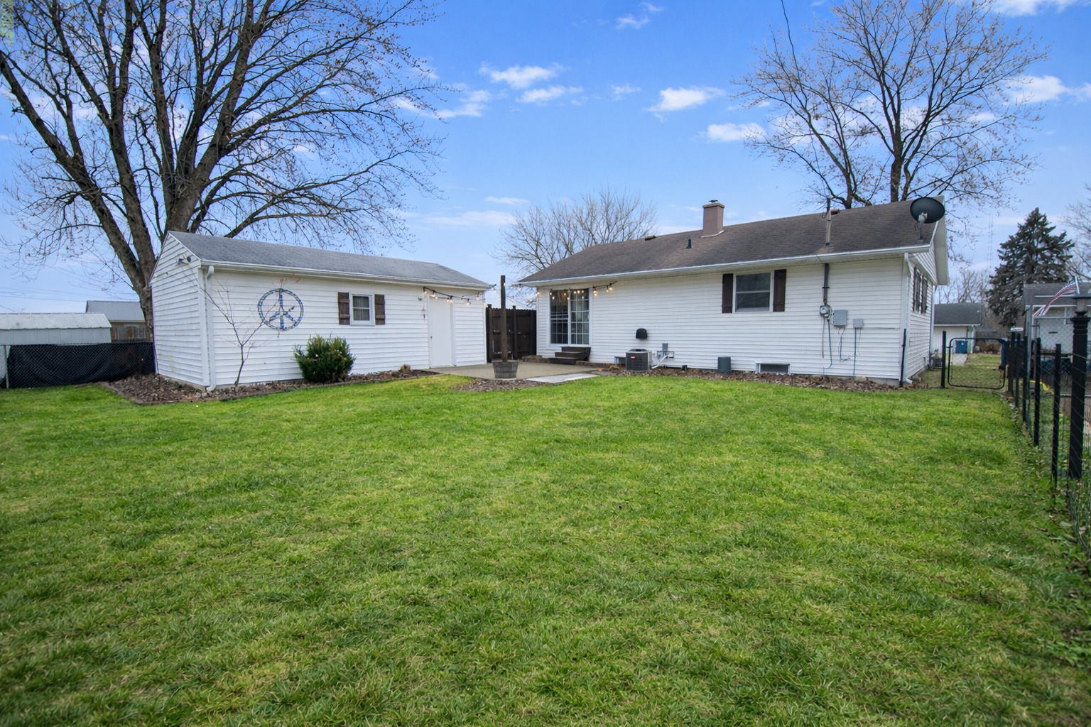 617 Orchard Street Dixon, IL 61021 - Photo 5 of 32 a big house with a big yard and large trees