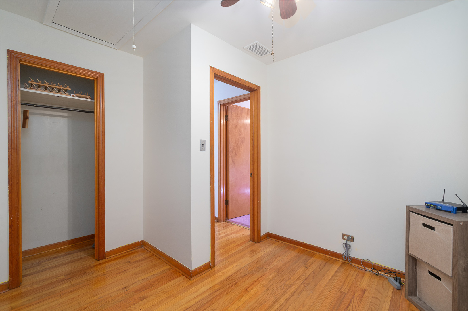 8008 Normandy Avenue Burbank, IL 60459 - Photo 19 of 41 a view of empty room with wooden floor