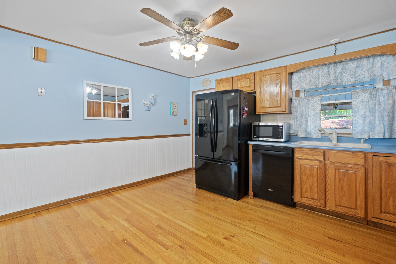 8008 Normandy Avenue Burbank, IL 60459 - Photo 3 of 41 a kitchen with stainless steel appliances granite countertop a refrigerator and a sink