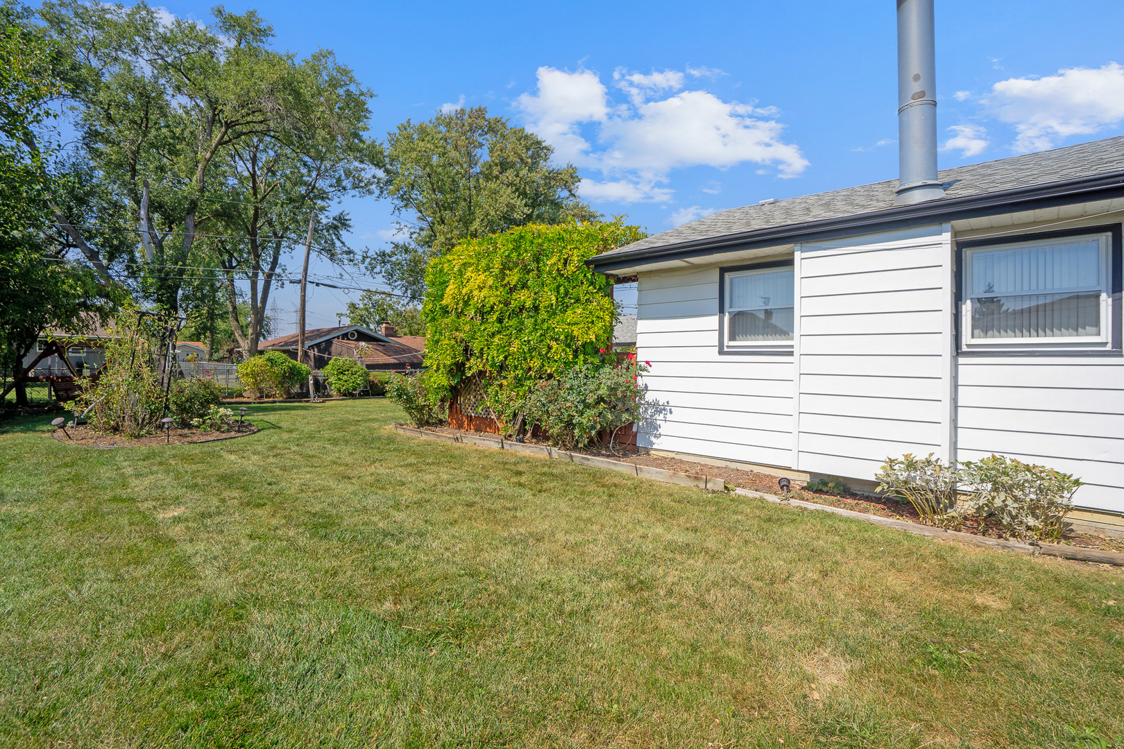 8008 Normandy Avenue Burbank, IL 60459 - Photo 32 of 41 a view of a backyard