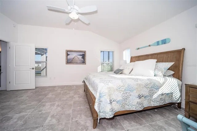 a room with a sink and mirror