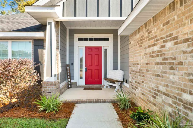 a front view of a house with a porch