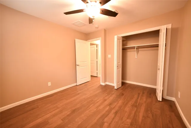 a view of a bathroom from a hallway