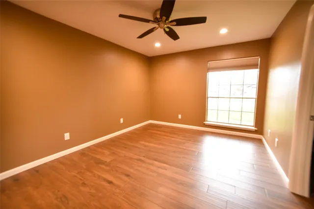 a view of a deck with a yard