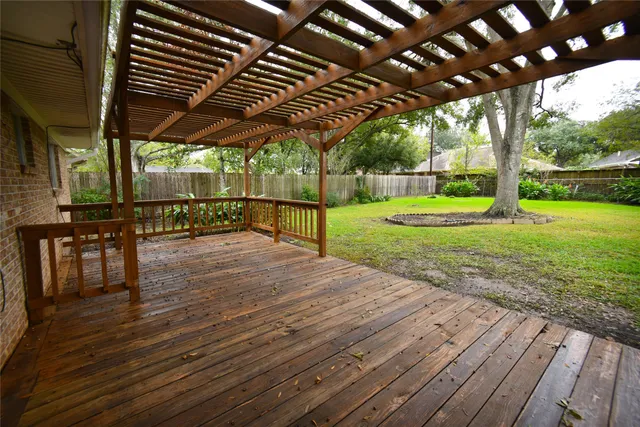 a view of porch with wooden floor