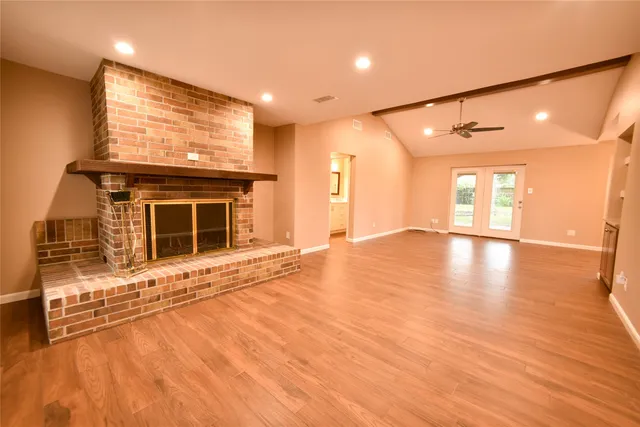 a view of a kitchen with a sink and a stove top oven