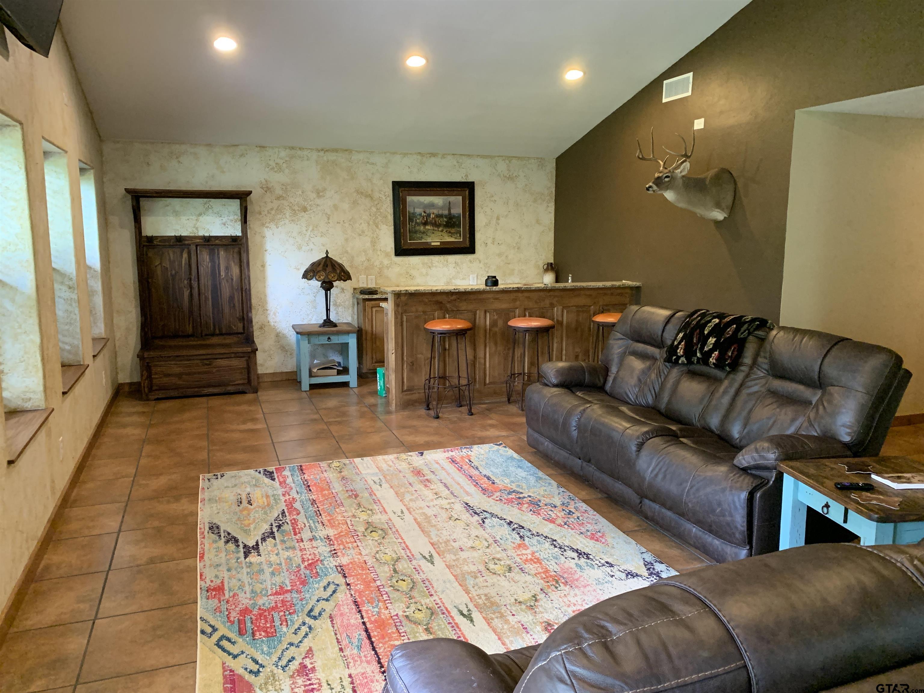 16650 C R 3419 Brownsboro, TX 75756 - Photo 17 of 36 a living room with furniture