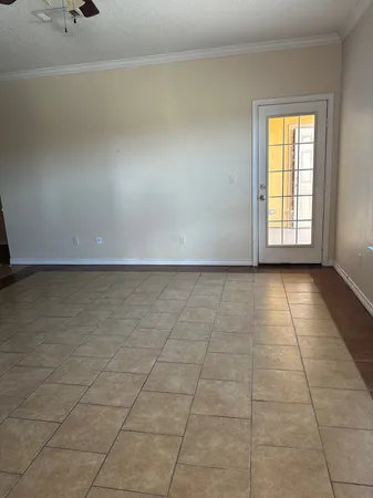 a view of an empty room and window