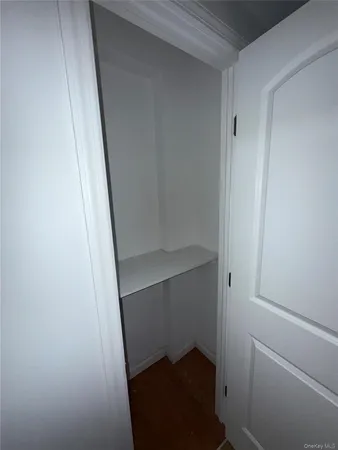 a room with gym equipment and a table