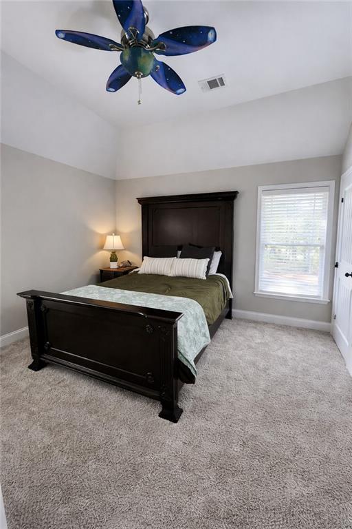 249 Serenity Loop Cataula, GA 31804 - Photo 13 of 16 a bedroom with bed and window
