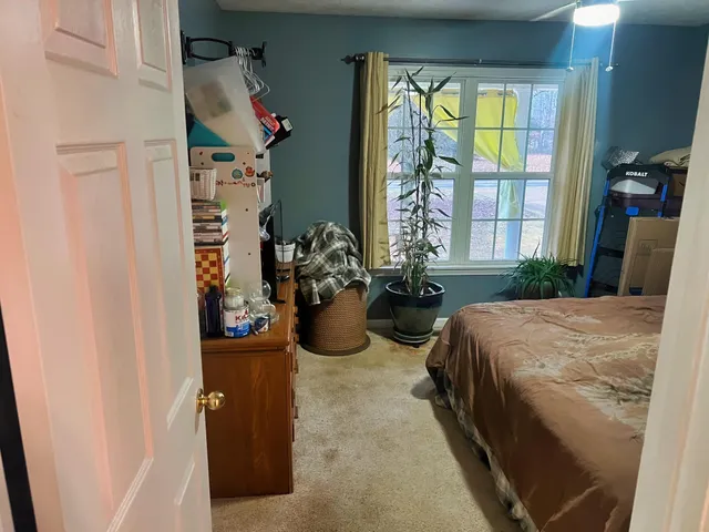 a view of a workspace with furniture