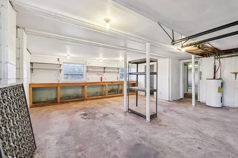 a view of backyard with outdoor and entertaining space