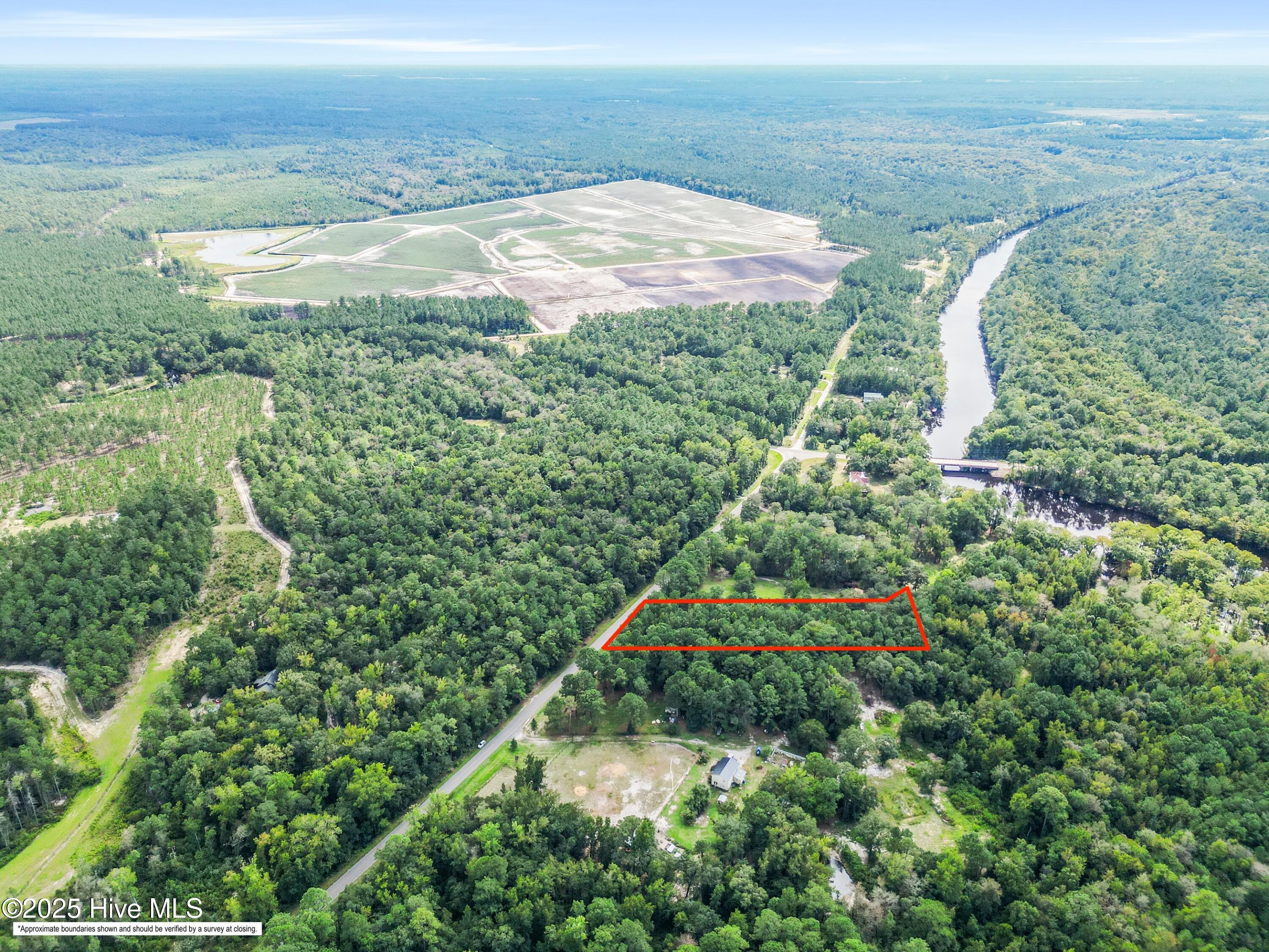 3.6-ac Ivanhoe Road Atkinson, NC 28421 - Photo 5 of 13 Boundary lines shown in drone images are approximate and for visual reference only. Buyers are advised to obtain a survey for accurate property lines prior to closing.