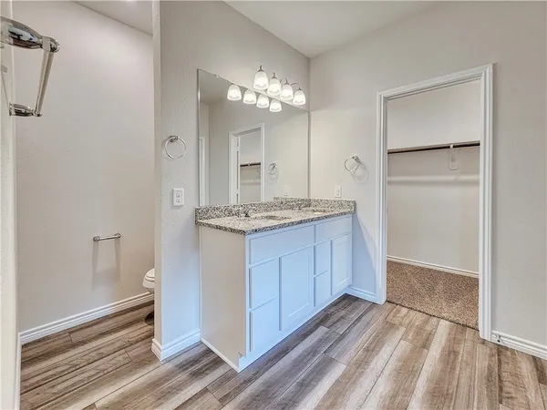 a view of a kitchen from the hallway