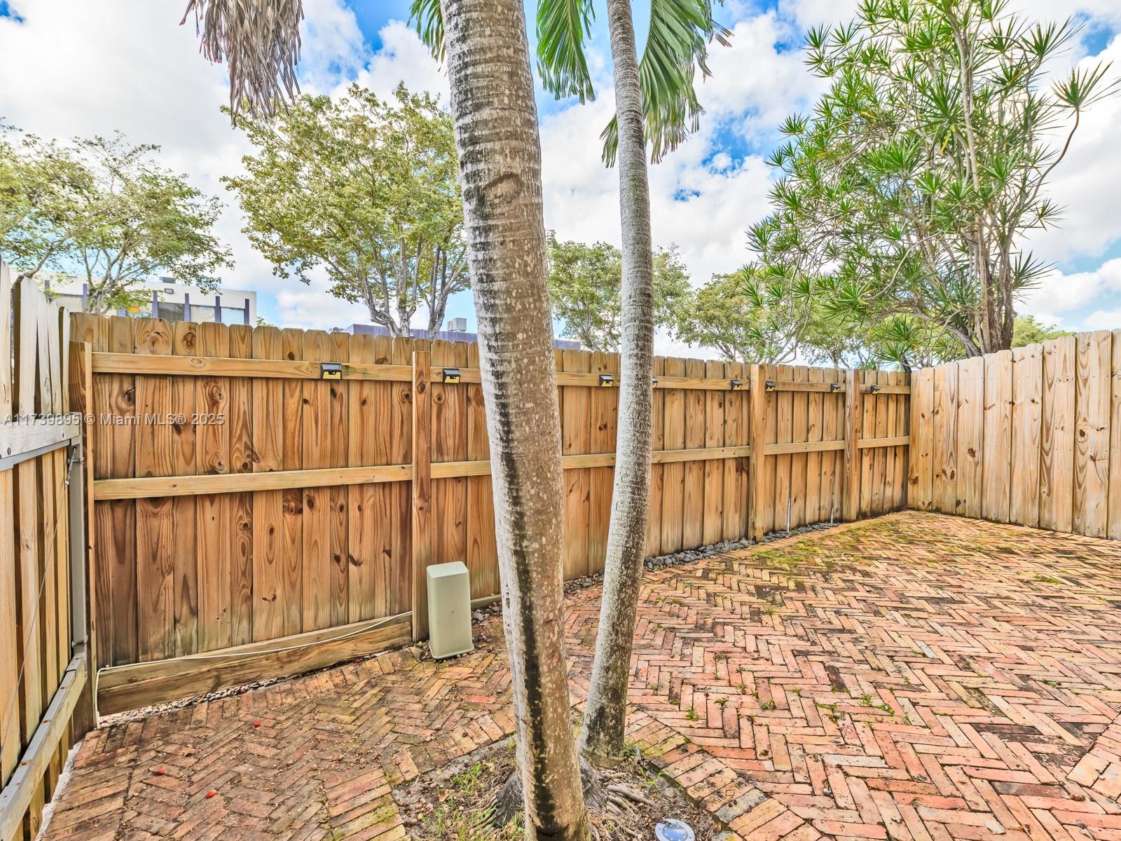 10900 Southwest 104th Street, Unit 114 Miami, FL 33176 - Photo 19 of 31 a view of entryway with wooden floor