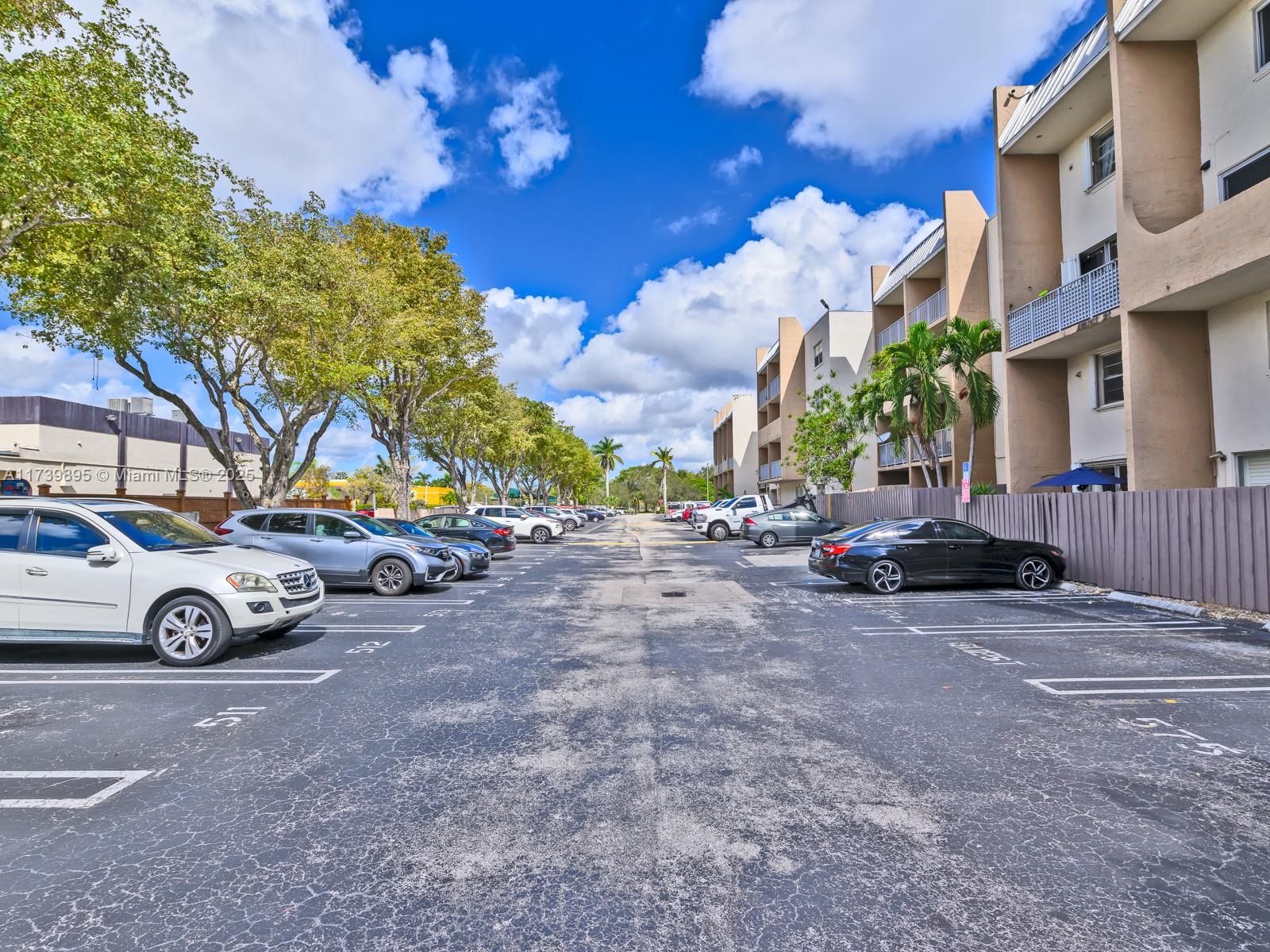 10900 Southwest 104th Street, Unit 114 Miami, FL 33176 - Photo 31 of 31 a view of a street with cars