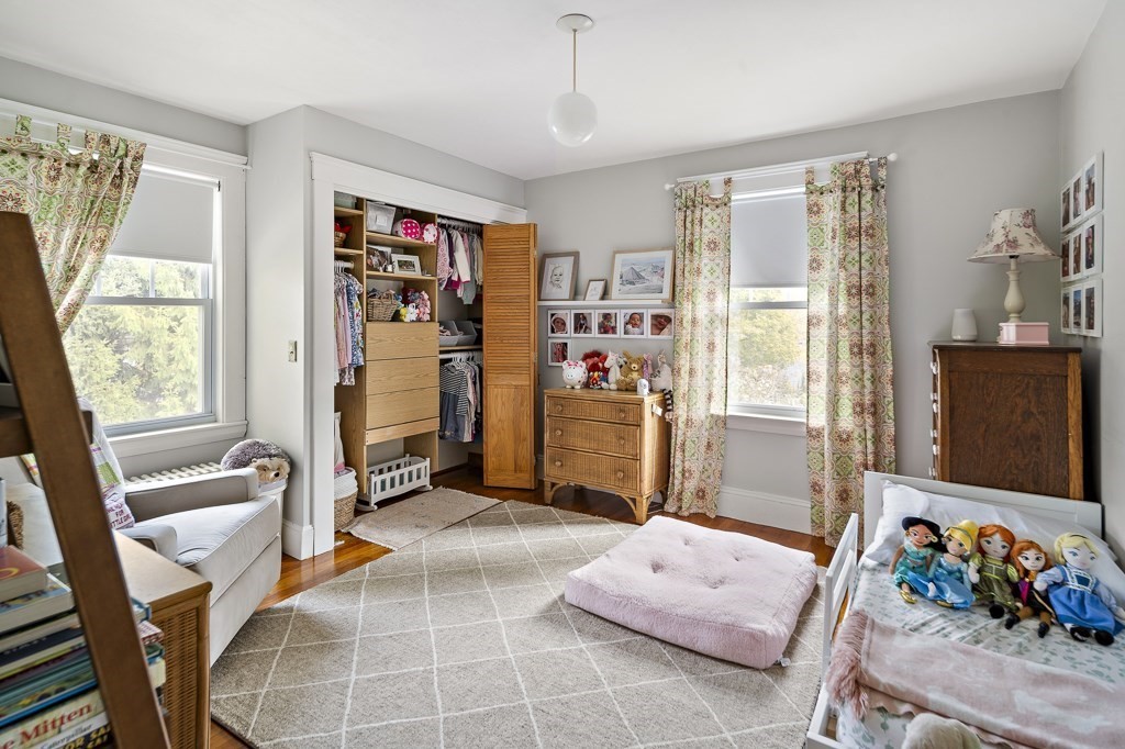 1 Bancroft Road Wellesley, MA 02481 - Photo 13 of 20 a living room with furniture and a window