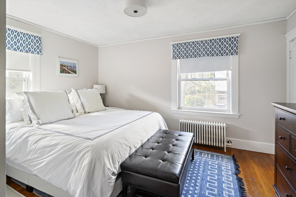 1 Bancroft Road Wellesley, MA 02481 - Photo 16 of 20 a bedroom with a bed and a window