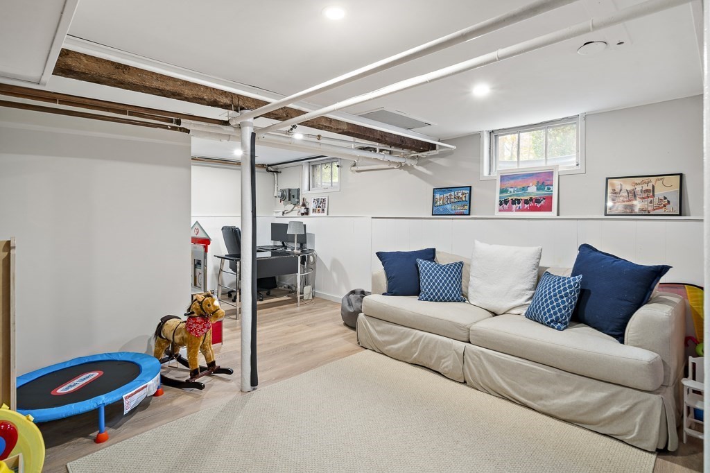 1 Bancroft Road Wellesley, MA 02481 - Photo 18 of 20 a bedroom with furniture and a gym machine