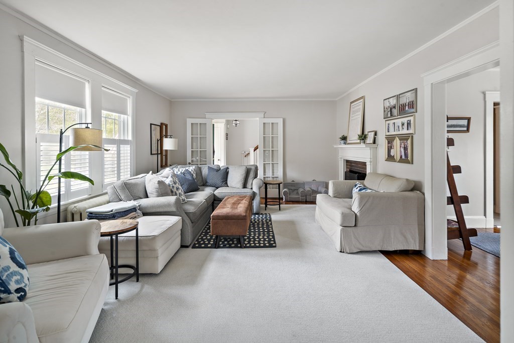 1 Bancroft Road Wellesley, MA 02481 - Photo 5 of 20 a living room with furniture and a large window