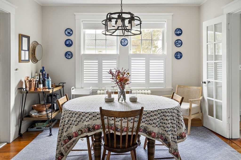 1 Bancroft Road Wellesley, MA 02481 - Photo 6 of 20 a dining room with furniture a chandelier and window