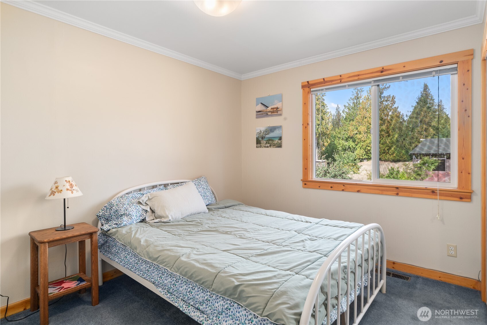 2035 Egg And I Road Chimacum, WA 98325 - Photo 14 of 40 a bedroom with a bed and a window