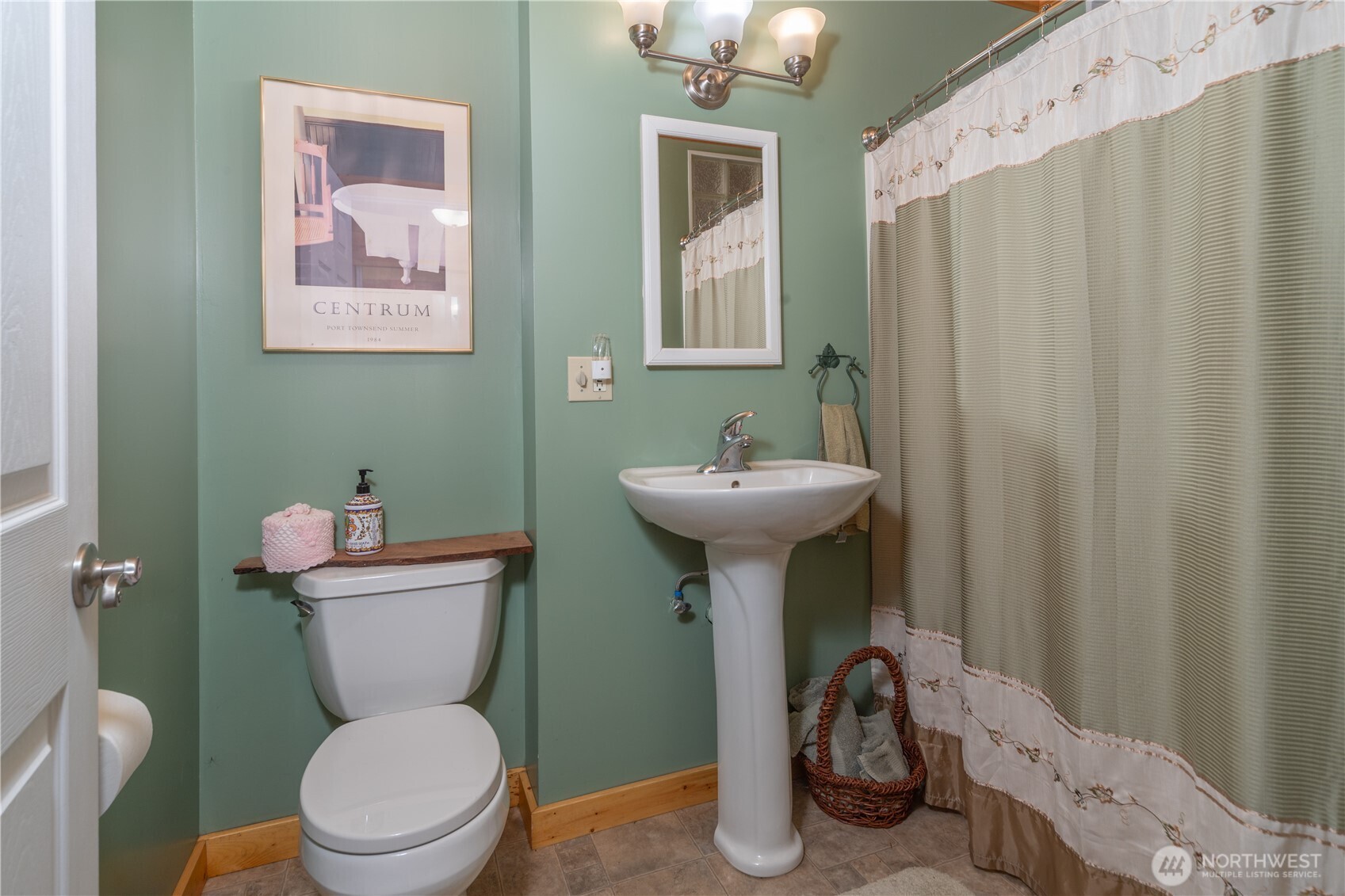 2035 Egg And I Road Chimacum, WA 98325 - Photo 17 of 40 a bathroom with a toilet sink and mirror